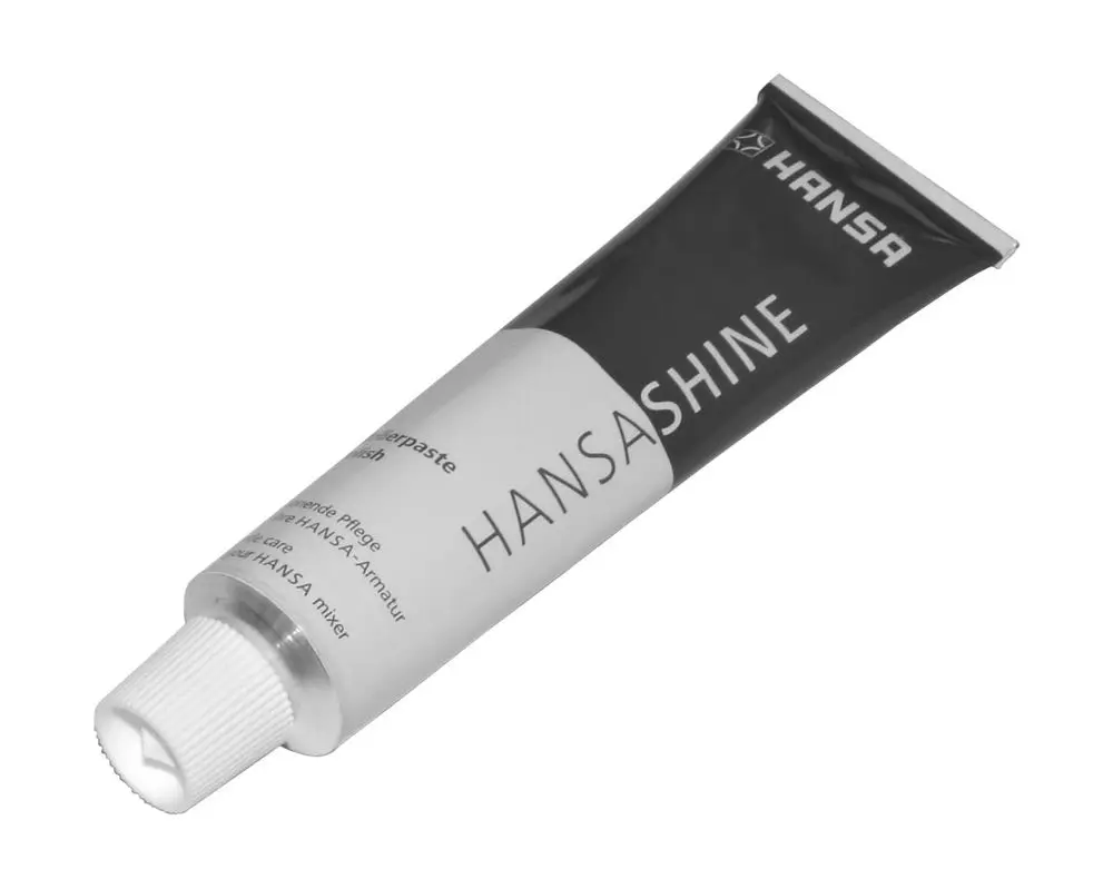 Alu-Tube mit schwarzem und weißem Design, verschlossen mit einer Drehkappe, markiert mit "HANSA" und der Aufschrift für ein Reinigungsprodukt.